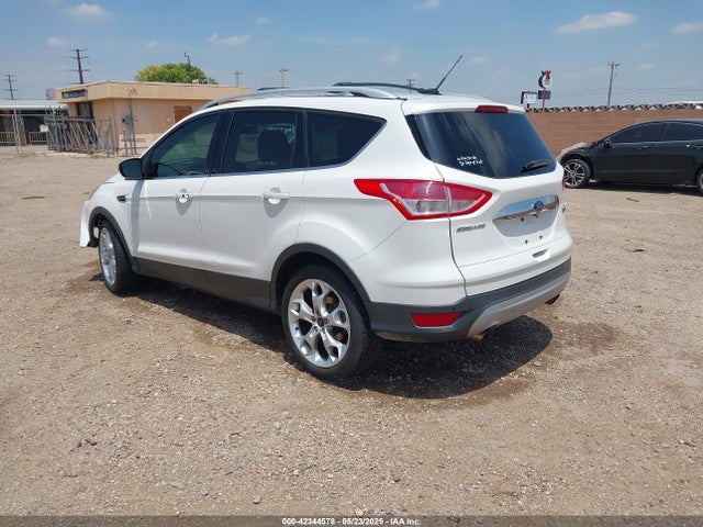 1FMCU0J92EUE38738 Ford 2014
