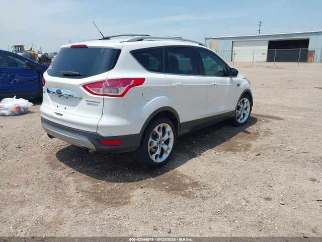 1FMCU0J92EUE38738 Ford 2014