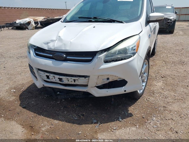 1FMCU0J92EUE38738 Ford 2014