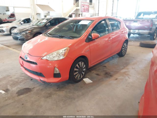 2012 TOYOTA PRIUS C JTDKDTB39C1023250 Photo 1