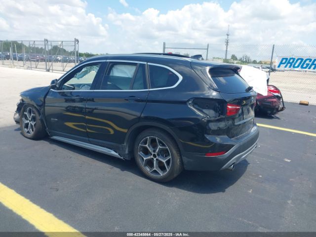 2018 BMW X1 WBXHT3C35J5K27371 Photo 2