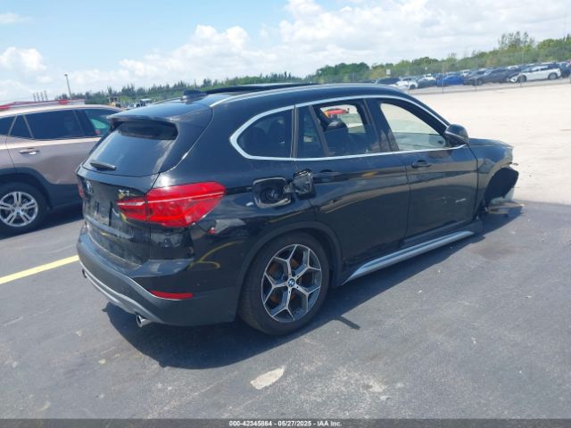 2018 BMW X1 WBXHT3C35J5K27371 Photo 3