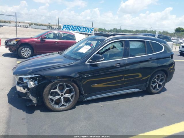 2018 BMW X1 WBXHT3C35J5K27371 Photo 5