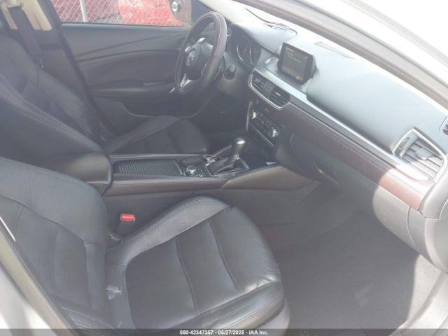 JM1GJ1W59G1450027 Mazda py
