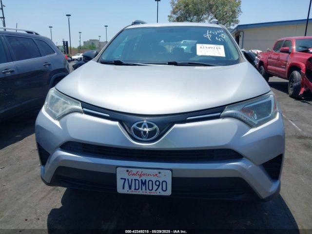 2T3ZFREV7GW312028 Toyota RAV4 LE