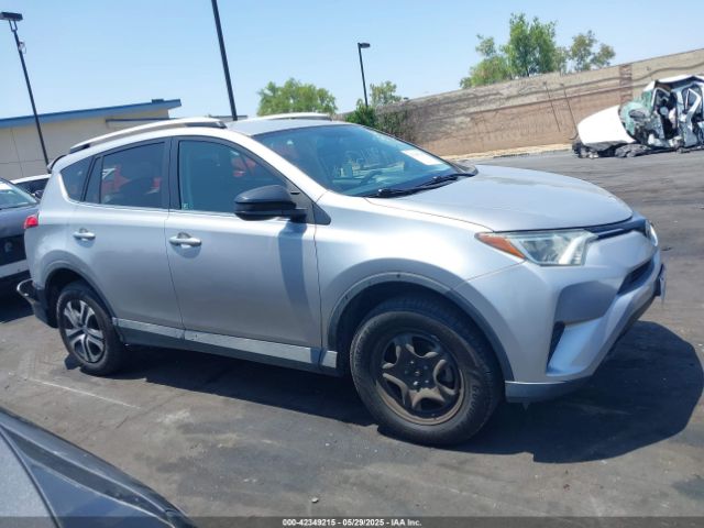 2T3ZFREV7GW312028 Toyota RAV4 LE