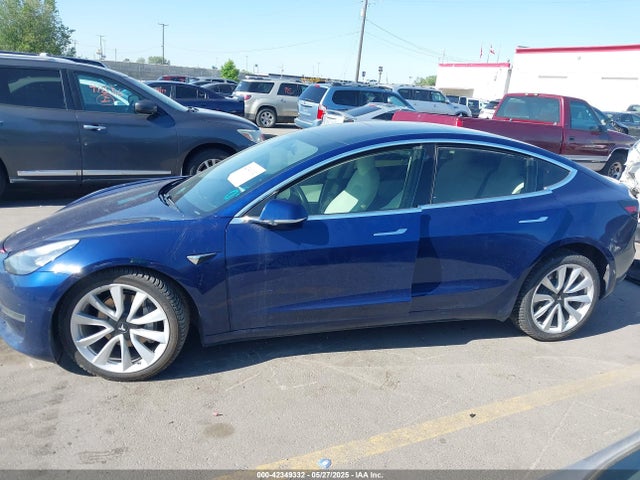 5YJ3E1EB2JF112106 Tesla 2018