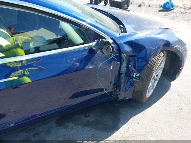 5YJ3E1EB2JF112106 Tesla 2018