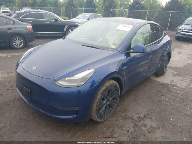 2024 TESLA MODEL Y 7SAYGDEE2RA321479 Photo 1