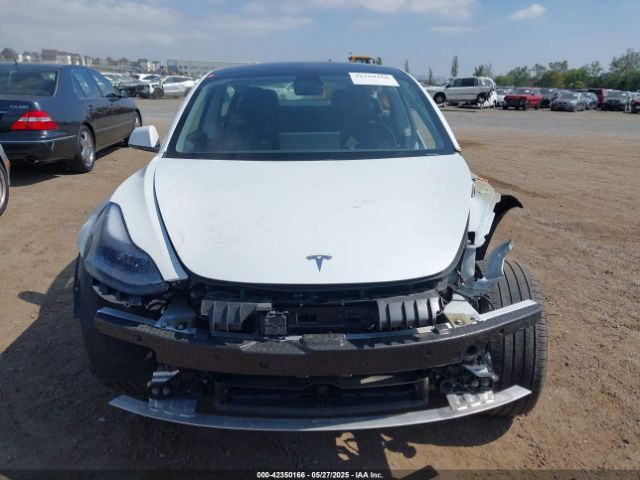 5YJ3E1EA6MF940333 Tesla 2021