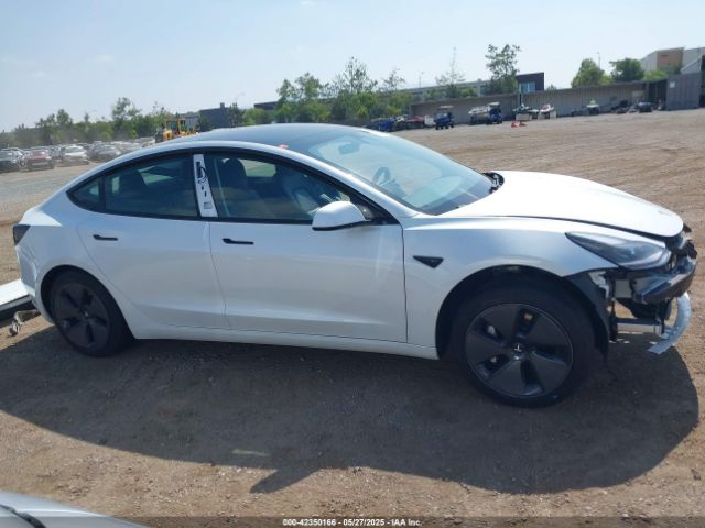 5YJ3E1EA6MF940333 Tesla 2021