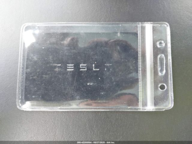 5YJ3E1EC7LF586659 Tesla 2020