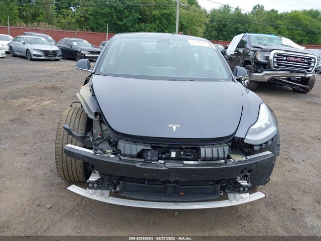 5YJ3E1EC7LF586659 Tesla 2020