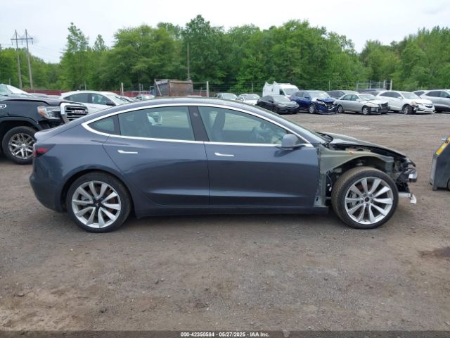 5YJ3E1EC7LF586659 Tesla 2020