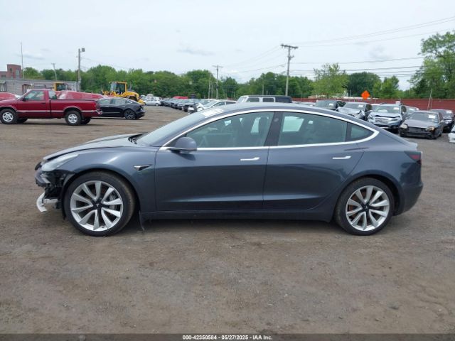 5YJ3E1EC7LF586659 Tesla 2020