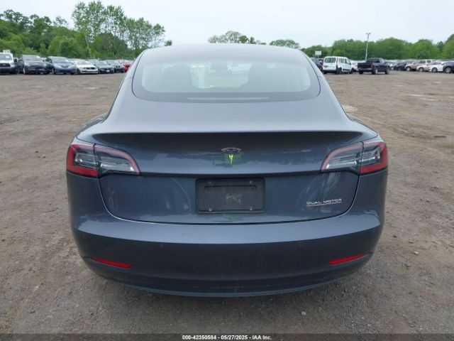 5YJ3E1EC7LF586659 Tesla 2020