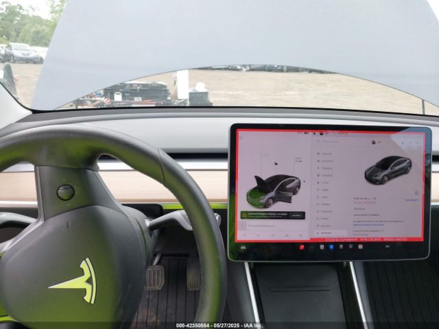 5YJ3E1EC7LF586659 Tesla 2020