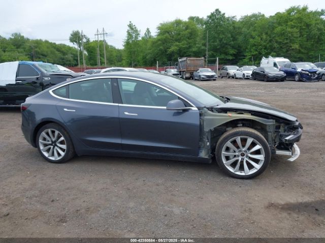 5YJ3E1EC7LF586659 Tesla 2020