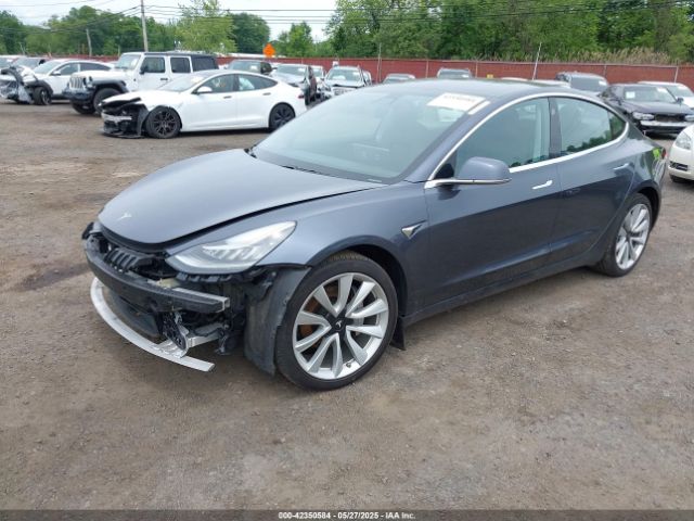 5YJ3E1EC7LF586659 Tesla 2020