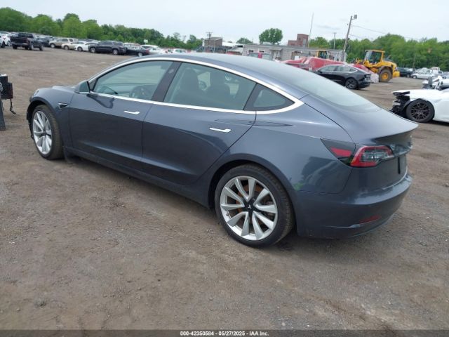 5YJ3E1EC7LF586659 Tesla 2020