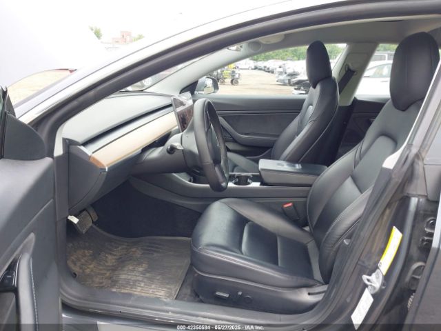 5YJ3E1EC7LF586659 Tesla 2020