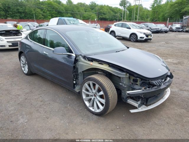 5YJ3E1EC7LF586659 Tesla 2020
