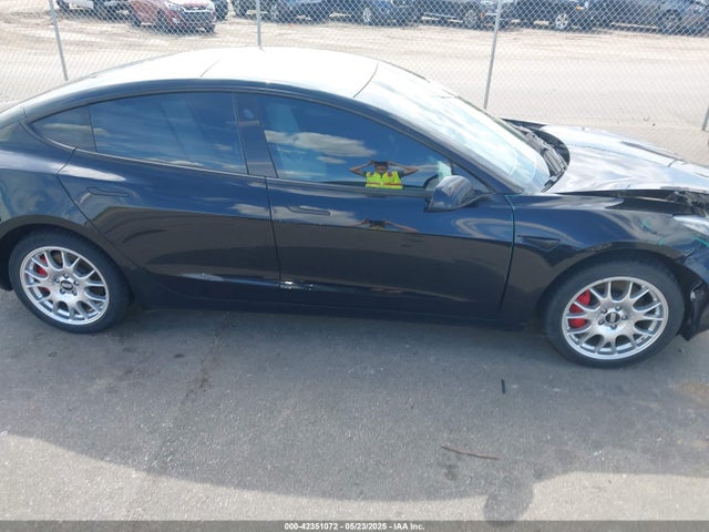 5YJ3E1EC9NF240616 Tesla 2022