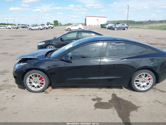5YJ3E1EC9NF240616 Tesla 2022