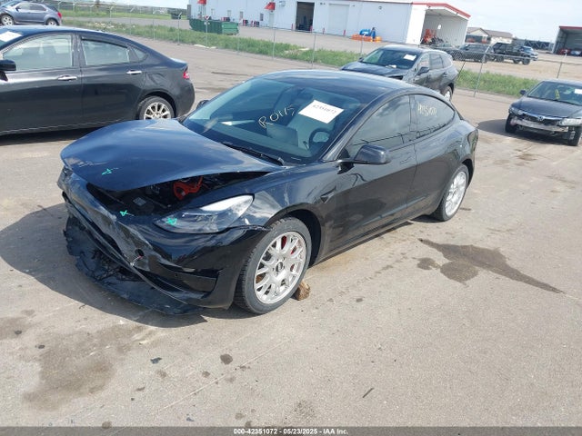 5YJ3E1EC9NF240616 Tesla 2022
