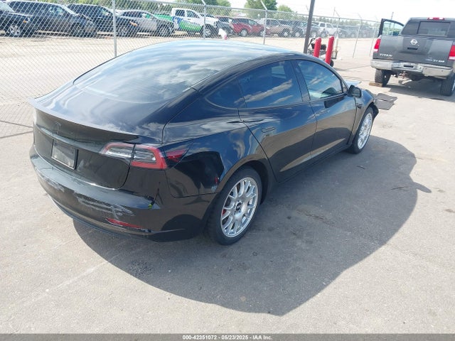5YJ3E1EC9NF240616 Tesla 2022