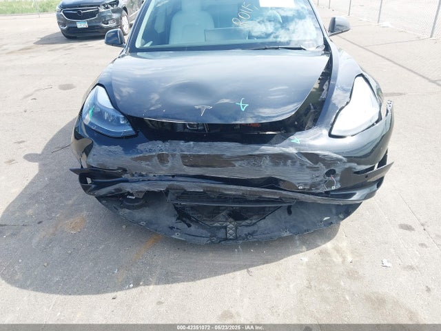5YJ3E1EC9NF240616 Tesla 2022