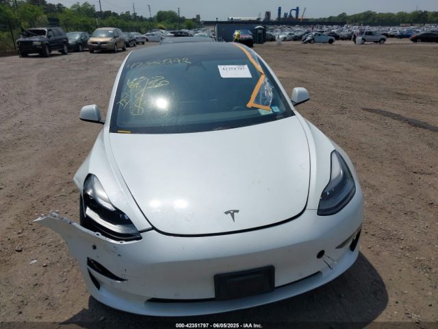 5YJ3E1EA8MF871483 Tesla 2021