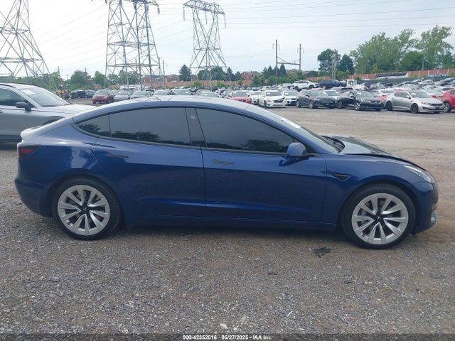 5YJ3E1EA9NF199483 Tesla 2022