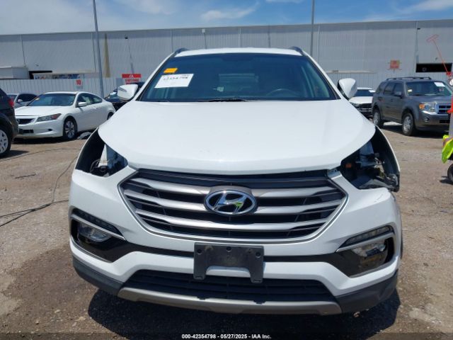 5NMZU3LB6HH042677 Hyundai Santa Fe Sport 2.4l
