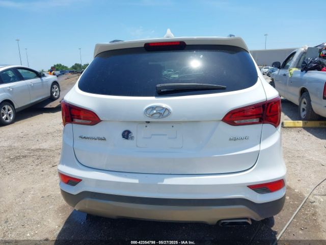 5NMZU3LB6HH042677 Hyundai Santa Fe Sport 2.4l