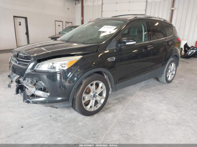 1FMCU0J9XEUA90770 Ford Escape Titanium