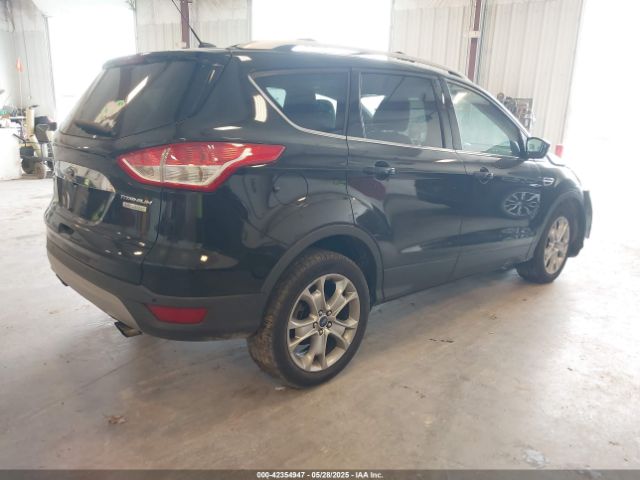 1FMCU0J9XEUA90770 Ford Escape Titanium