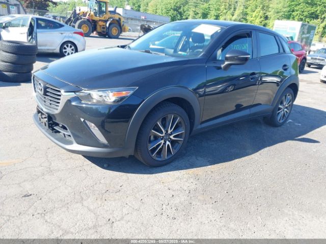JM1DKFC73J0321605 Mazda Cx-3 Touring