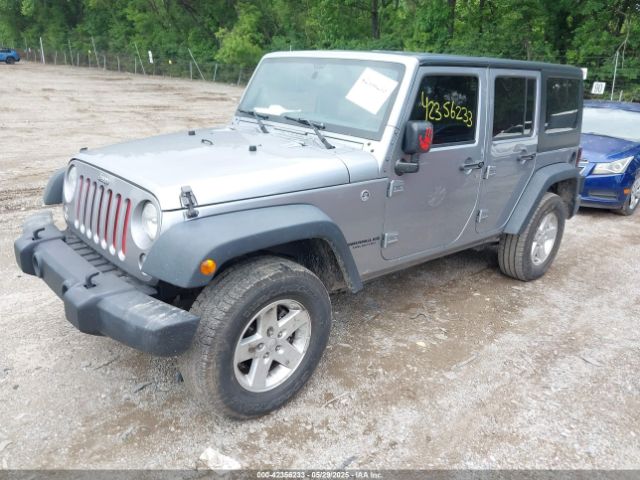 1C4BJWDG4GL129299 Jeep Wrangler Unlimited Sport