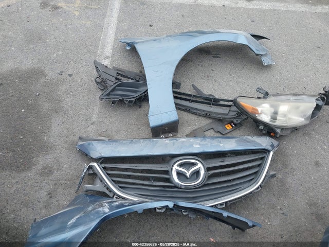JM1GJ1V52G1473182 Mazda py