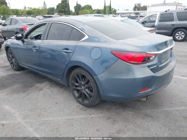 JM1GJ1V52G1473182 Mazda py