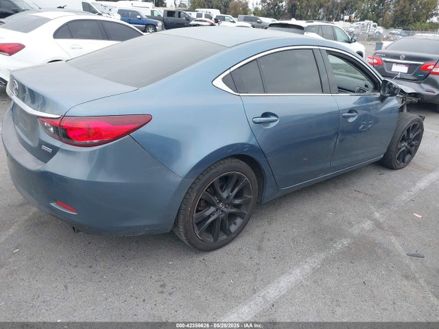 JM1GJ1V52G1473182 Mazda py