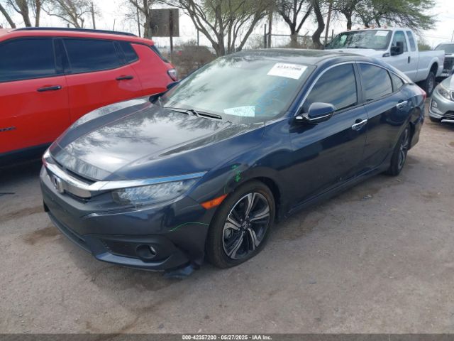 JHMFC1F96JX003957 Honda Civic Touring