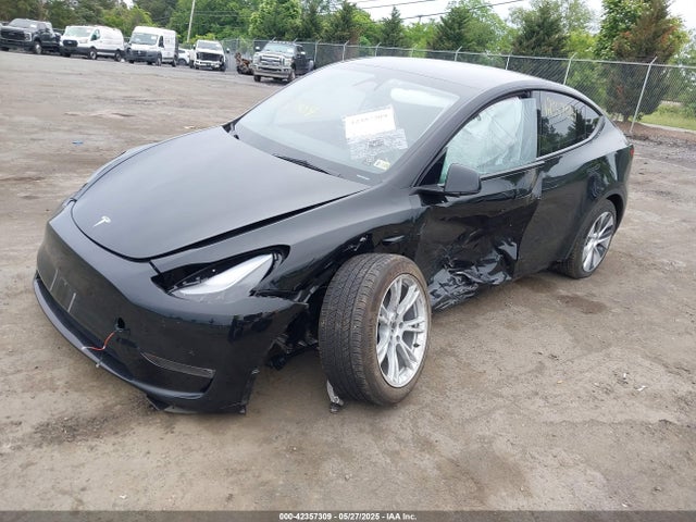 2023 TESLA MODEL Y 7SAYGDEE7PF874595 Photo 1