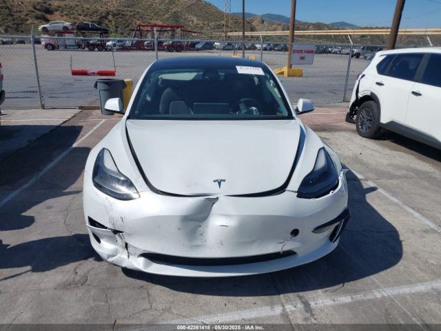 5YJ3E1EB1NF106433 Tesla 2022