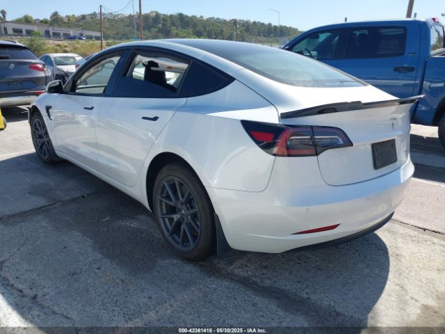 5YJ3E1EB1NF106433 Tesla 2022