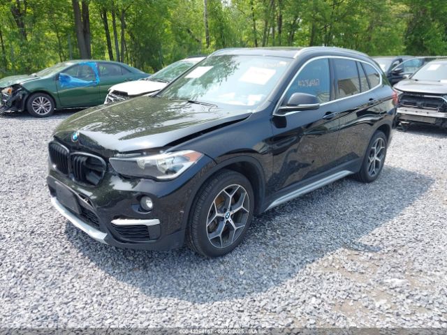 2018 BMW X1 WBXHT3C32J5L31106 Photo 1