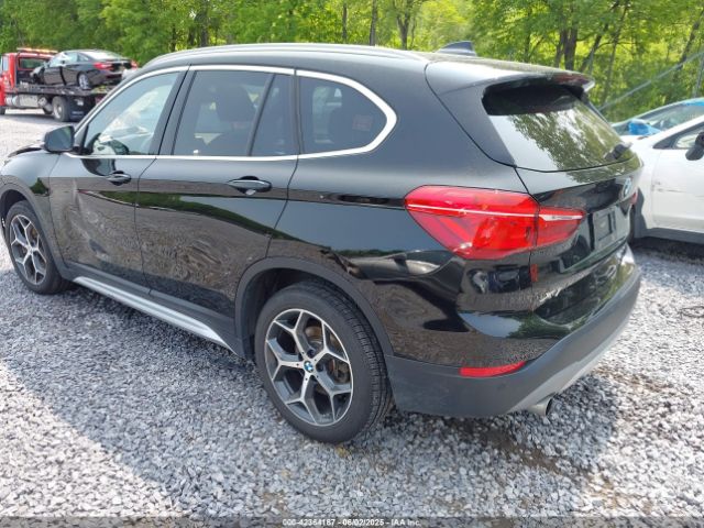 2018 BMW X1 WBXHT3C32J5L31106 Photo 2