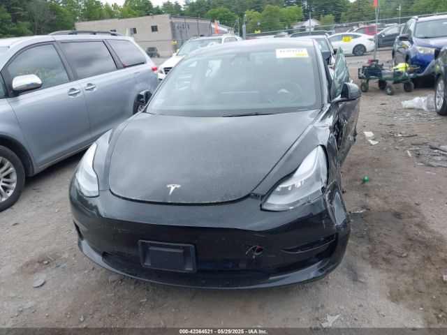 5YJ3E1EB7NF165647 Tesla 2022