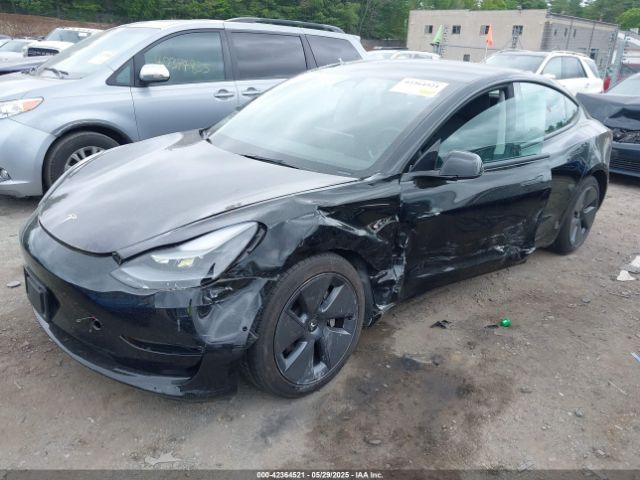 5YJ3E1EB7NF165647 Tesla 2022